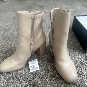 Size 10 booties brand new, never worn.